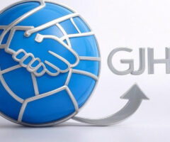 "Modern icon for Gulf Job Hunt featuring a blue globe with a white world map, a handshake symbolizing employment, a silver upward arrow for career growth, and the letters 'GJH' in silver, all framed by a silver ring."